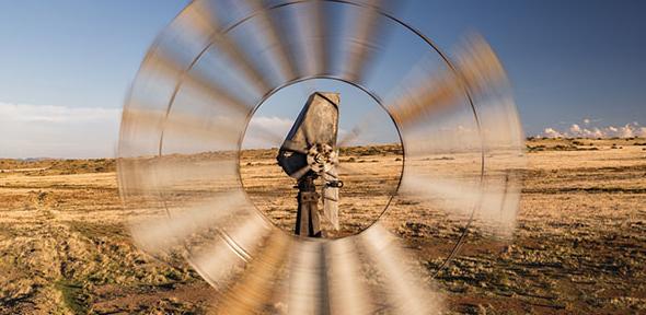 Drone shot in front of a spinning weather station, Free State, South Africa 