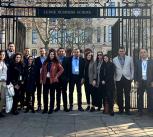 Students standing in front of Cambridge Judge Business School