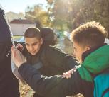 Teenage boys fighting on way to school