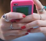 Teenager holding a smartphone
